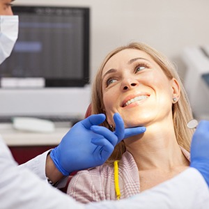 Woman in dental chair during dental consultation. 